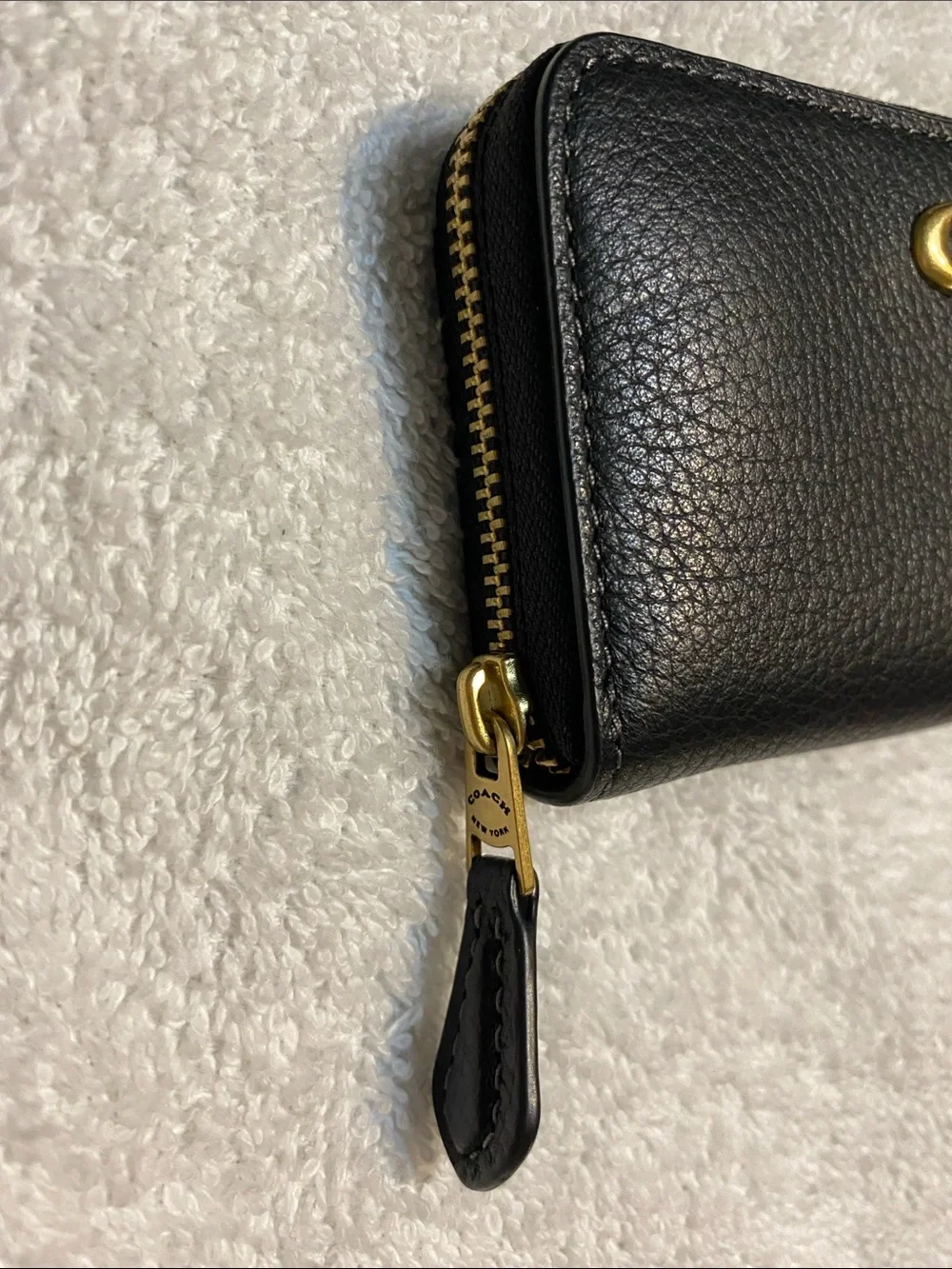 Coach Black Pebbled Leather Zip Card Holder with Gold 'C' Accent